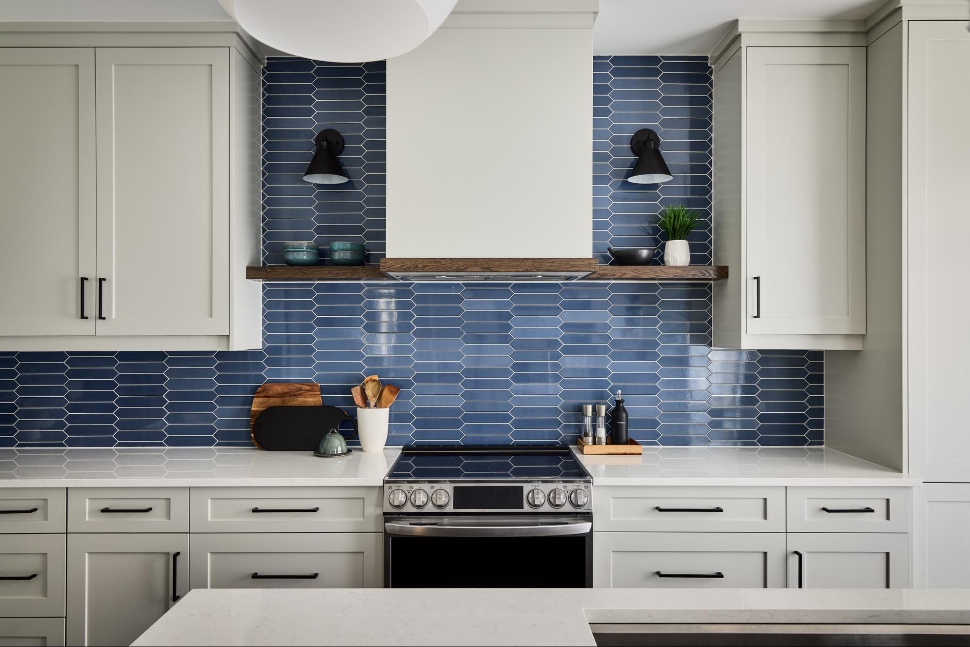 Creating Flow and Function: How Removing Walls Transformed This Orleans Kitchen. Image of new kitchen with blue back splash. 